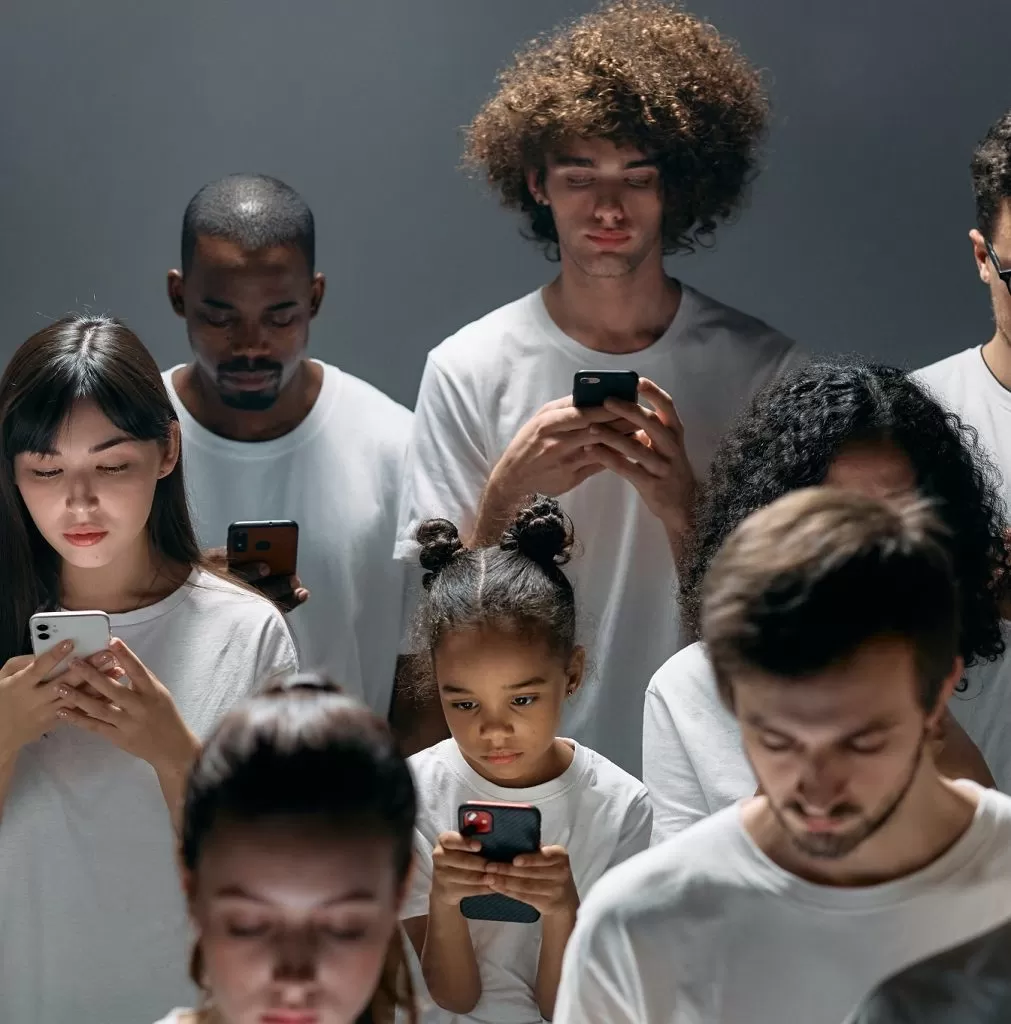 Diverse people checking their phones with a sad resemblance